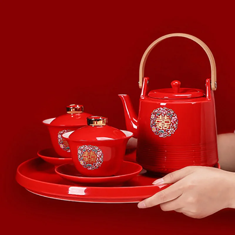 Chinese Wedding Supplies Red Ceramic Tea Set Teapot Gaiwan Set with Serving Tea Tray Wedding Party Souvenir Gift Porcelain 
Chinese Wedding Supplies Red Ceramic Tea Set Teapot Gaiwan Set with Serving Tea Tray Wedding Party Souvenir Gift Porcelain