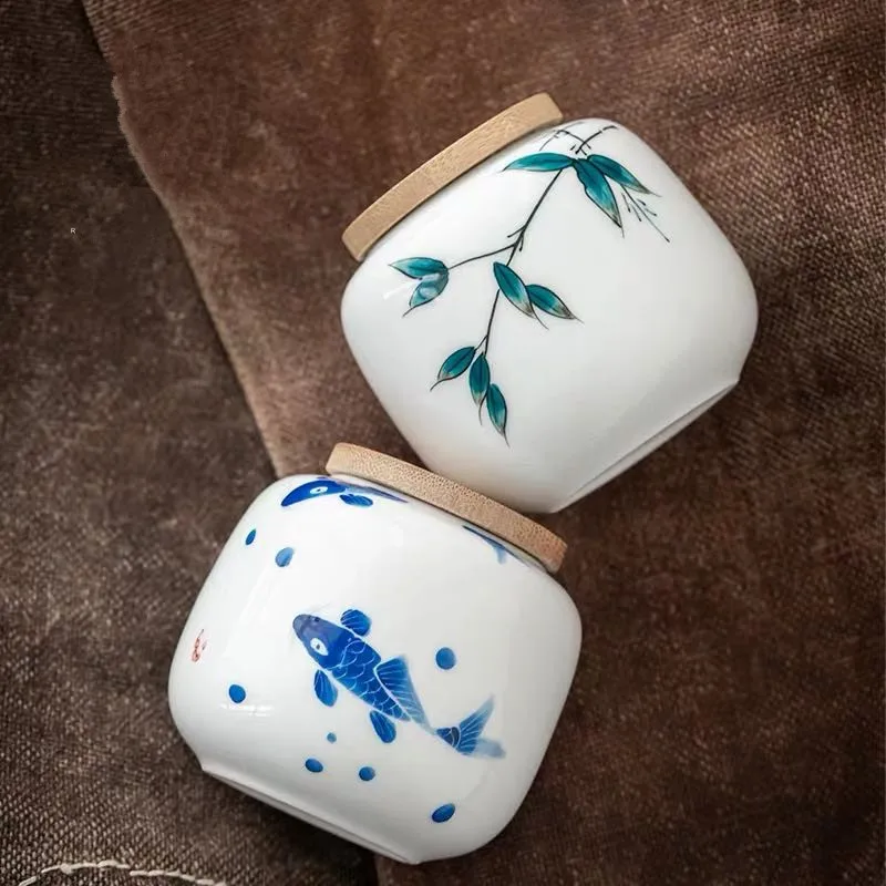 Hand-Painted Ceramic Tea Jar Small Portable Sealed Cans Household Tea Box Tea Warehouse Storage Jar Tea Container Tea Tins
Hand-Painted Ceramic Tea Jar Small Portable Sealed Cans Household Tea Box Tea Warehouse Storage Jar Tea Container Tea Tins