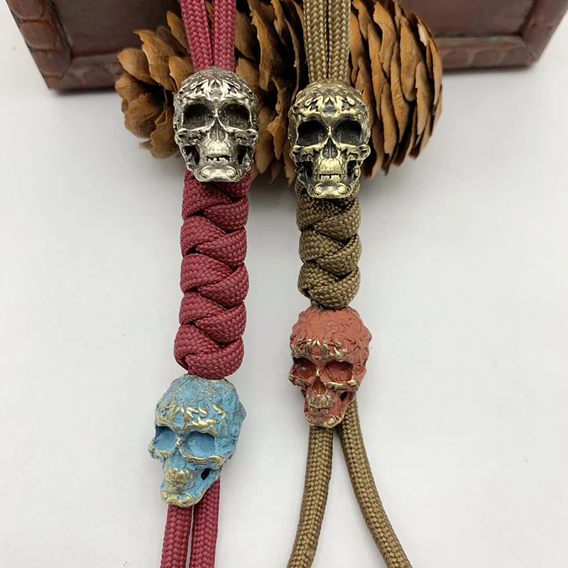 Рисунок в стиле панк бусины в форме черепа нож ремешок Подвески ювелирные изделия латунь DIY Паракорд Браслеты Аксессуары EDC уличные инструменты брелки
Рисунок в стиле панк бусины в форме черепа нож ремешок Подвески ювелирные изделия латунь DIY Паракорд Браслеты Аксессуары EDC уличные инструменты брелки