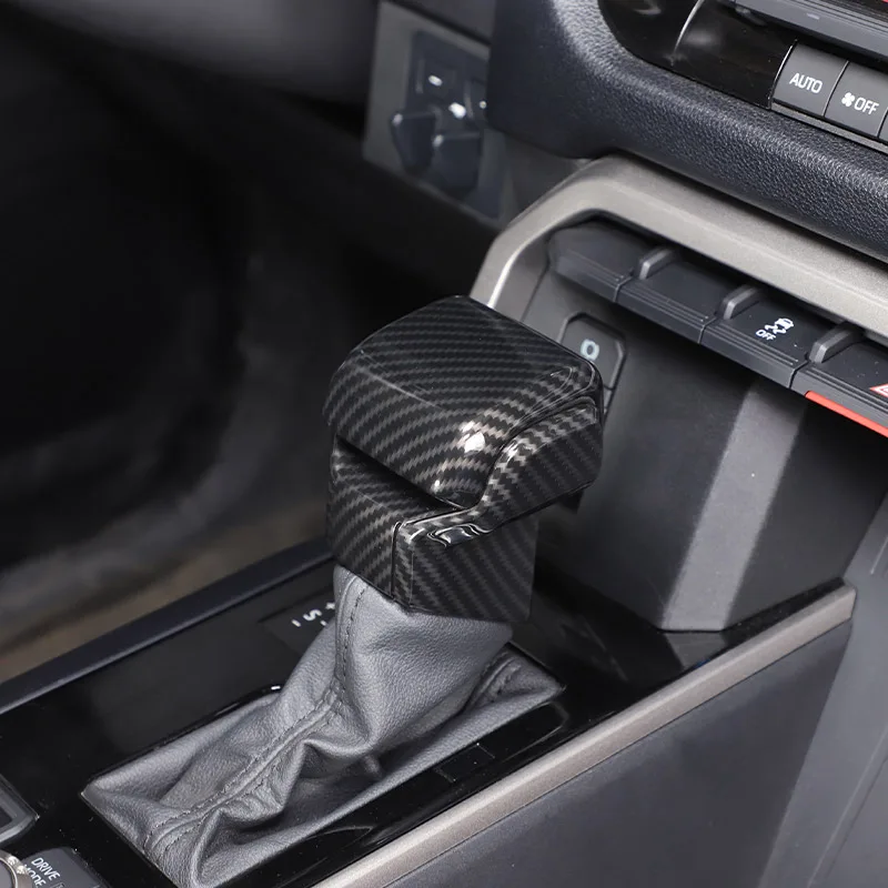 For Toyota Tundra / Sequoia 2022-2023 ABS Carbon fiber / Red Car Shift Lever Head Decorative Sticker Car Interior Accessories
For Toyota Tundra / Sequoia 2022-2023 ABS Carbon fiber / Red Car Shift Lever Head Decorative Sticker Car Interior Accessories