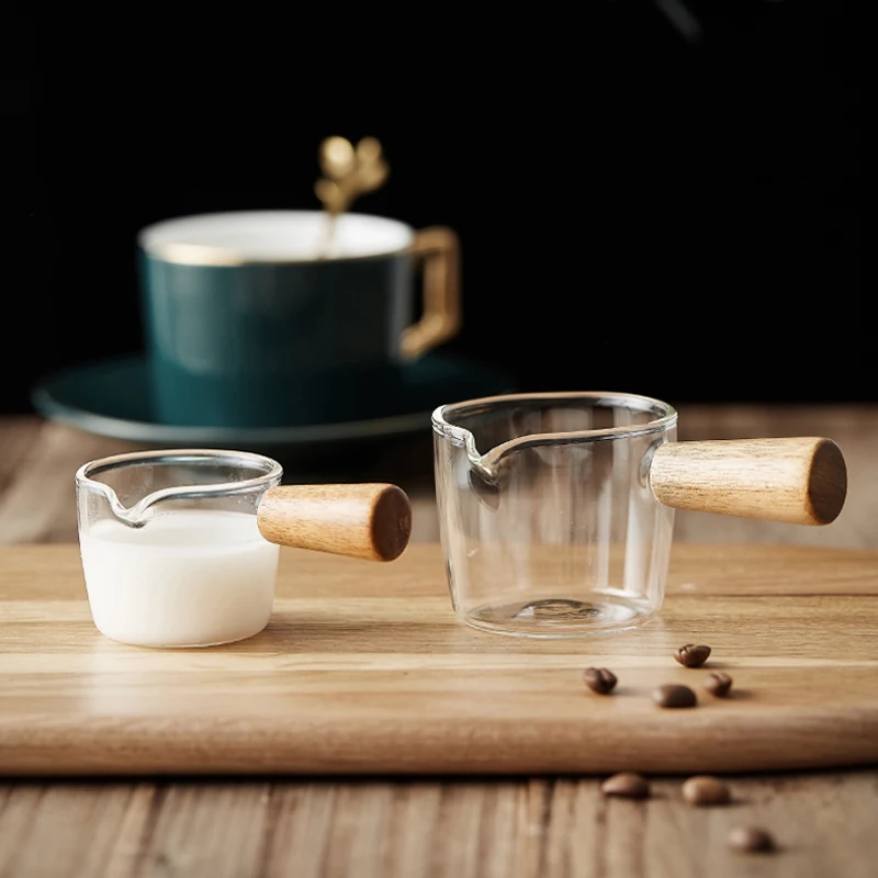 1 PC Glass Milk Frother Jug Transparent Small Glass Coffee Creamer Jug with Wood Handle Kitchen Accessories
1 PC Glass Milk Frother Jug Transparent Small Glass Coffee Creamer Jug with Wood Handle Kitchen Accessories