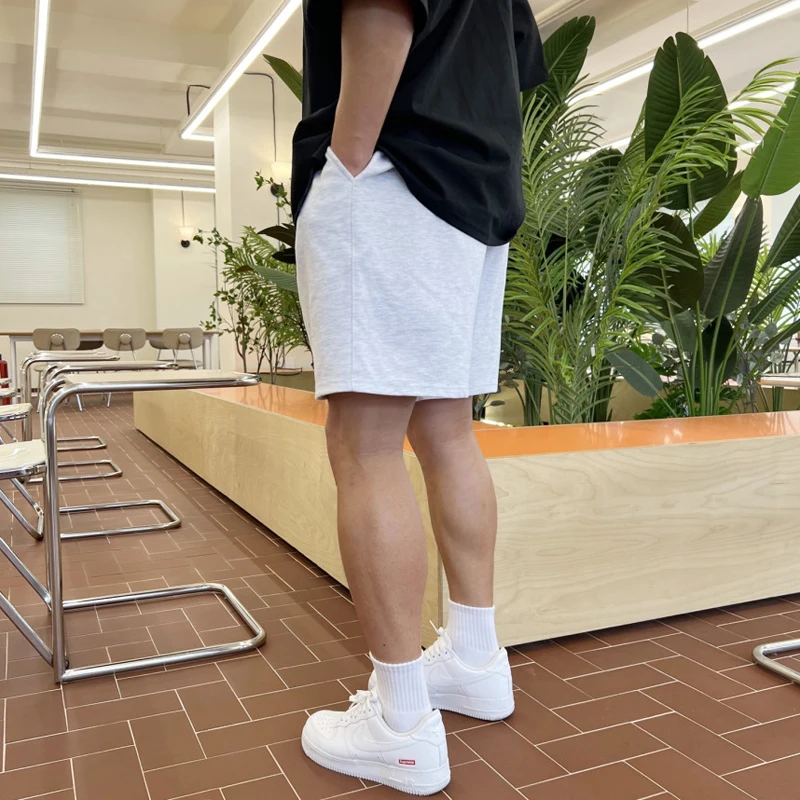 Pantalones cortos deportivos de algodón para hombre, shorts informales de cintura alta, Color sólido, elásticos de cinco puntos
Pantalones cortos deportivos de algodón para hombre, shorts informales de cintura alta, Color sólido, elásticos de cinco puntos