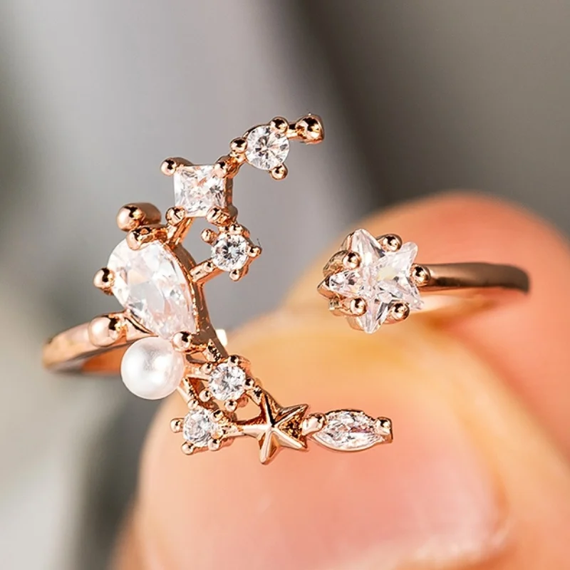 Korean Fashion Moon Star Adjustable Rings for Women Zircon Pearl Decoration Ring Wedding Anniversary Party Rose Gold Jewelry
Korean Fashion Moon Star Adjustable Rings for Women Zircon Pearl Decoration Ring Wedding Anniversary Party Rose Gold Jewelry
