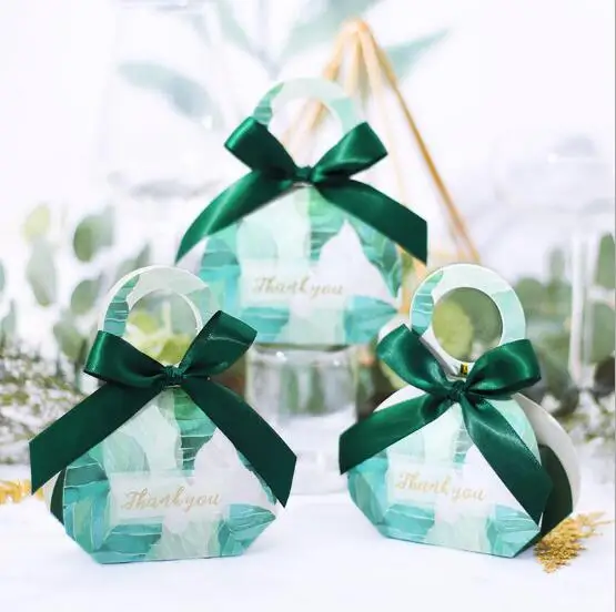 100Pcs Creative Green Forest Style Thank you Wedding Favors Candy Box Handbag Chocolate Boxes Party Supplies Gift Box
100Pcs Creative Green Forest Style Thank you Wedding Favors Candy Box Handbag Chocolate Boxes Party Supplies Gift Box