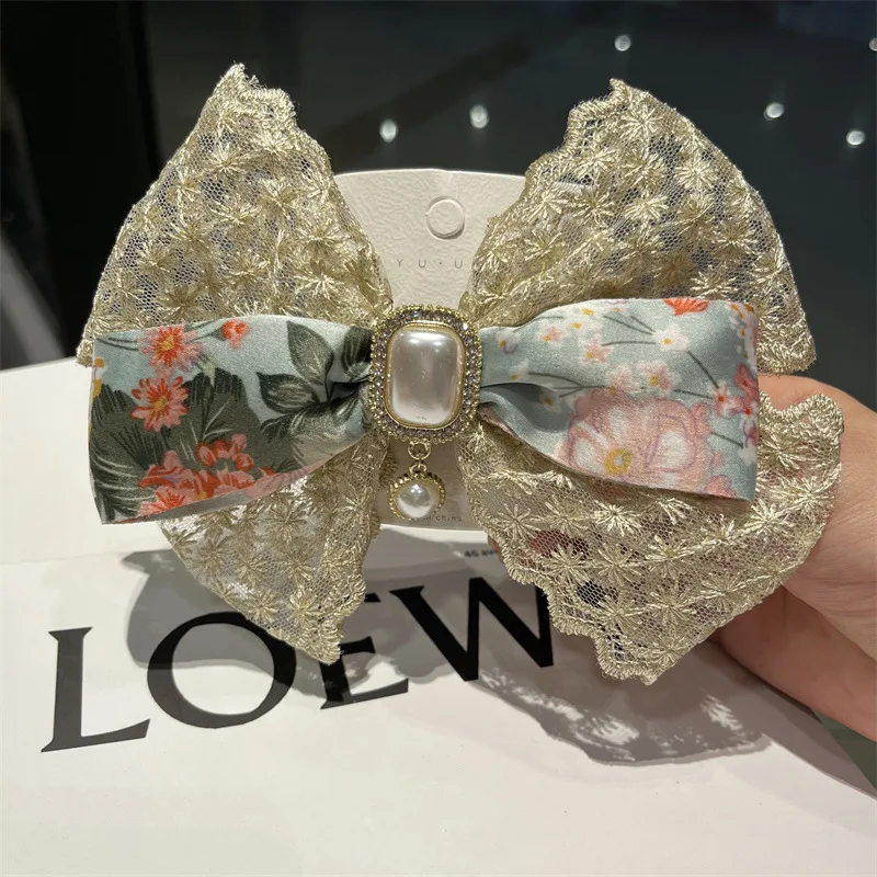 Vintage hairpin, bow, pearl spring clip, premium headwear design, hair accessories
Vintage hairpin, bow, pearl spring clip, premium headwear design, hair accessories