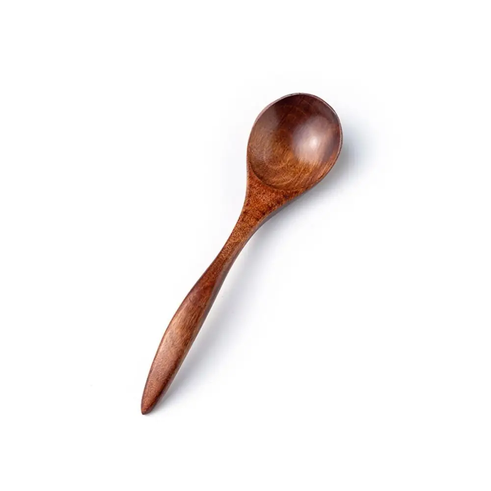 Деревянная ложка коричневого цвета
Деревянная ложка коричневого цвета