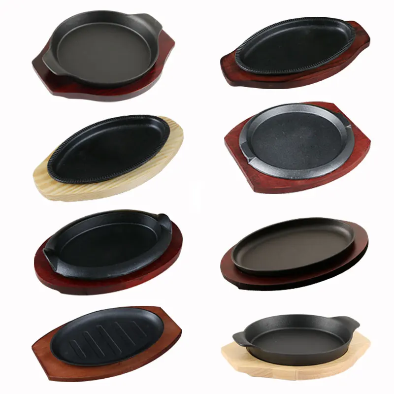 BBQ grilled plate round household baking raosting pan wooden tray kitchen pan Korean cast iron barbecue pot fried striped steak
BBQ grilled plate round household baking raosting pan wooden tray kitchen pan Korean cast iron barbecue pot fried striped steak