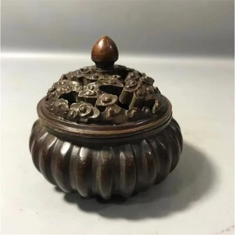 Archaize brass Pumpkin shape Auspicious clouds lid Incense burner household decoration crafts small statue
Archaize brass Pumpkin shape Auspicious clouds lid Incense burner household decoration crafts small statue