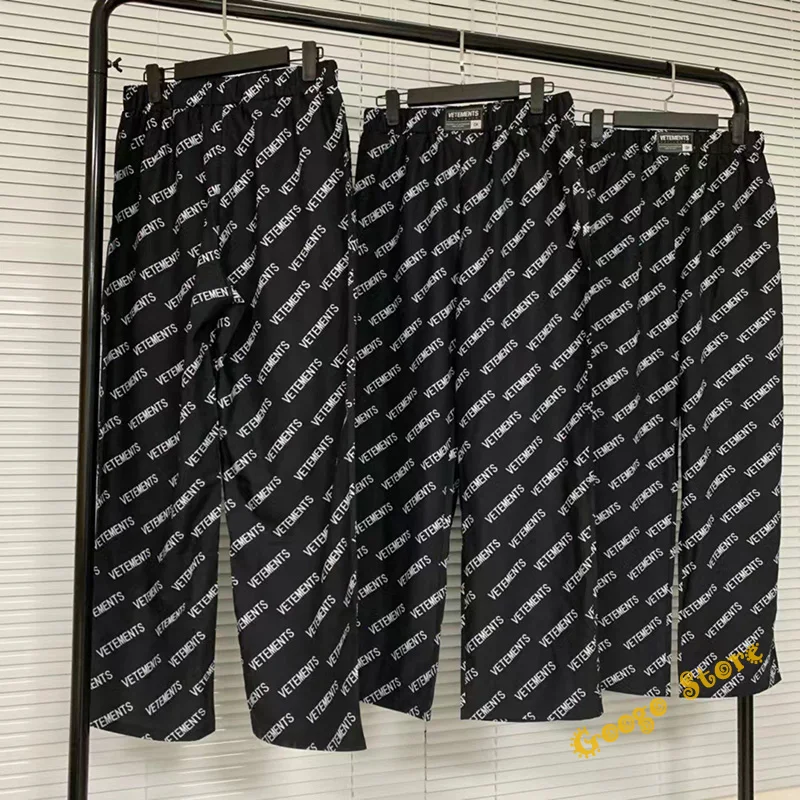 

With Tags Vetements Sweatpants Men Women Quick Drying Fashion Simple Full Logo Printing Classic Black Trousers Casual VTM Pants