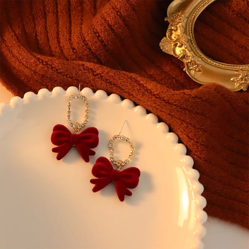 Wholesale Modern Women's Earrings 2021 Stainless Steel Earrings Wine Red Velvet Bow Autumn and Winter New Diamond Sweet Earrings
Wholesale Modern Women's Earrings 2021 Stainless Steel Earrings Wine Red Velvet Bow Autumn and Winter New Diamond Sweet Earrings