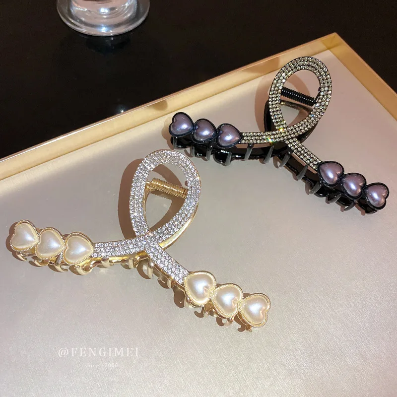 Korean Temperament Diamond Inlaid Pearl Love Grip, Fashionable Curling Hair Clip At The Back Of Head, Net Red, Versatile
Korean Temperament Diamond Inlaid Pearl Love Grip, Fashionable Curling Hair Clip At The Back Of Head, Net Red, Versatile