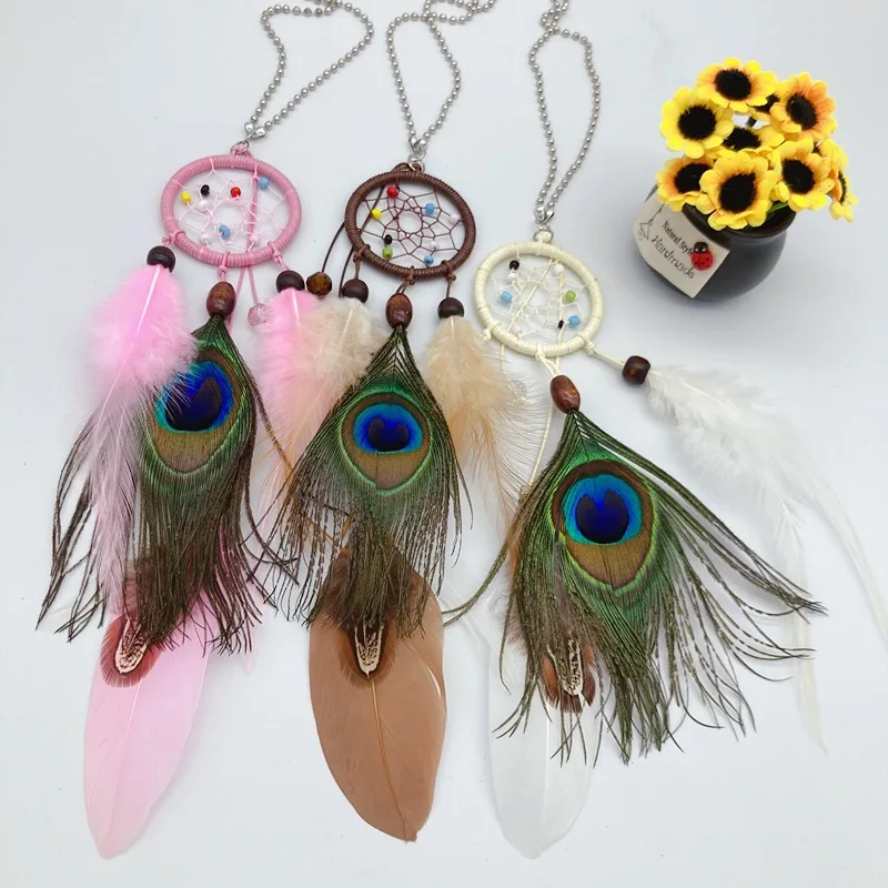 Peacock feather hand-woven dream catcher car home rearview mirror pendant ornaments creative car hanging handmade gifts
Peacock feather hand-woven dream catcher car home rearview mirror pendant ornaments creative car hanging handmade gifts