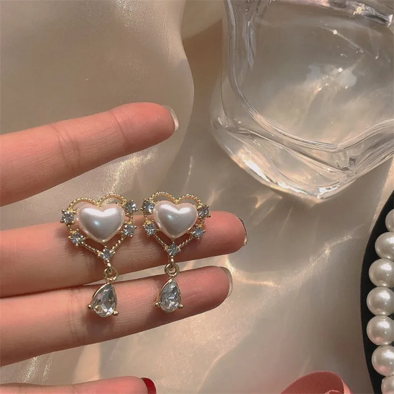 2022 New Needle Pearl Heart Earrings ~ Sweet Little Fresh Rhinestone Drop Earrings Female Korea Retro Simple Earrings
2022 New Needle Pearl Heart Earrings ~ Sweet Little Fresh Rhinestone Drop Earrings Female Korea Retro Simple Earrings