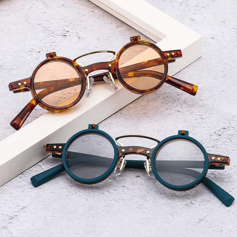 Popular Fashion Small Round Punk Double Bridges Women Sunglasses Retro Flip Lens Shades UV400 Men Rivets Sun Glasses
Popular Fashion Small Round Punk Double Bridges Women Sunglasses Retro Flip Lens Shades UV400 Men Rivets Sun Glasses