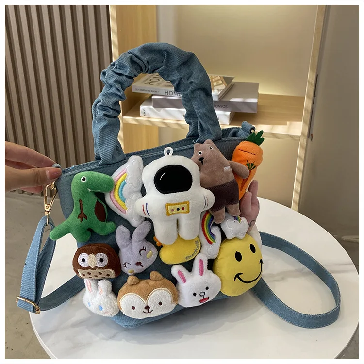 Cute Doll Pleated Handbag Japanese Cartoon Spaceman Doll One-Shoulder Bag All-Match Canvas Tote Bag Kawaii Animal Crossbody Bag
Cute Doll Pleated Handbag Japanese Cartoon Spaceman Doll One-Shoulder Bag All-Match Canvas Tote Bag Kawaii Animal Crossbody Bag