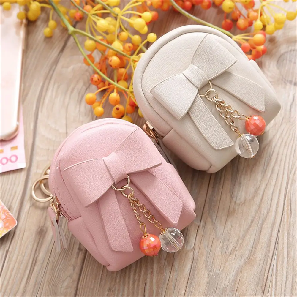 Korean Style Ladies Key Case Solid Color Small School Bag Bow Pendant Zipper Coin Purse Mini Small Wallet Handbag Girl Gift
Korean Style Ladies Key Case Solid Color Small School Bag Bow Pendant Zipper Coin Purse Mini Small Wallet Handbag Girl Gift