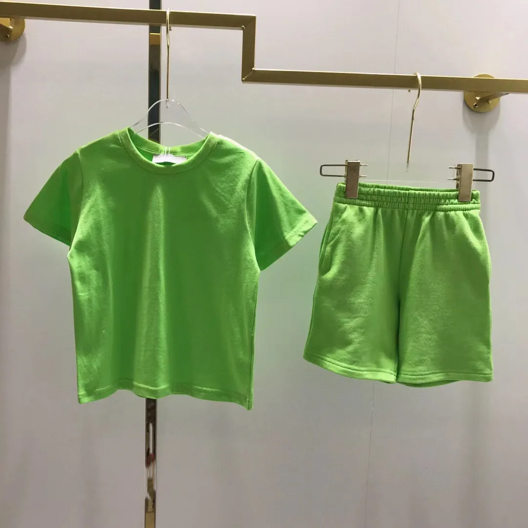 2022 Summer high quality fashion brand green cotton letter round neck T-shirt + Elastic Waist Shorts Boys and girls' set
2022 Summer high quality fashion brand green cotton letter round neck T-shirt + Elastic Waist Shorts Boys and girls' set