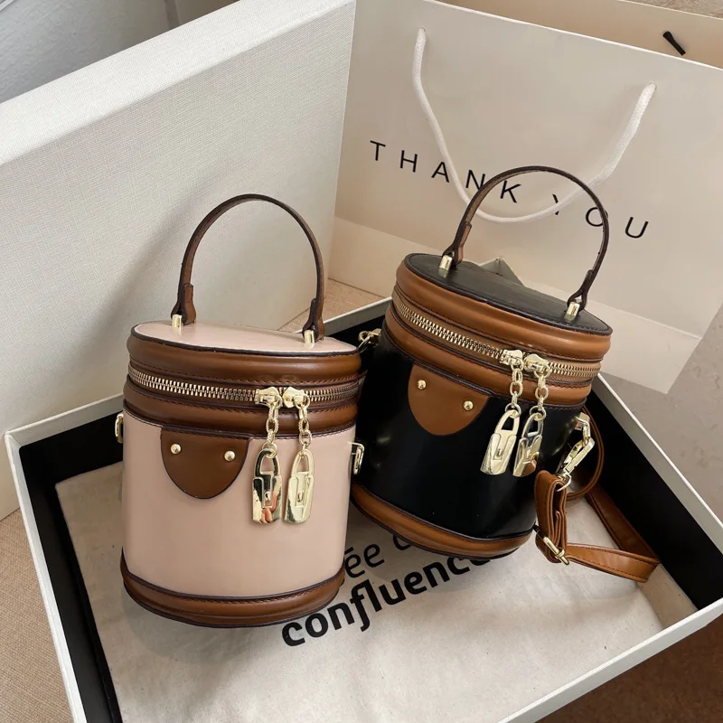 Bag women's bag fashion retro design portable bucket bag advanced sense of foreign style Lingge Single Shoulder Messenger Bag
Bag women's bag fashion retro design portable bucket bag advanced sense of foreign style Lingge Single Shoulder Messenger Bag