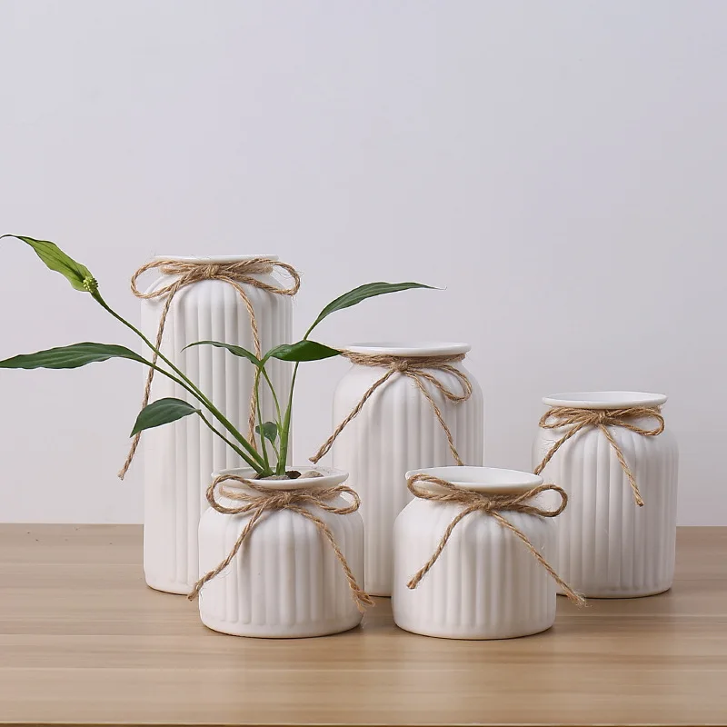 Modern Minimalist White Hemp Rope Ceramic Vase Flower Pot Flower Arrangement Technology Living Room Interior Decoration Ornament
Modern Minimalist White Hemp Rope Ceramic Vase Flower Pot Flower Arrangement Technology Living Room Interior Decoration Ornament