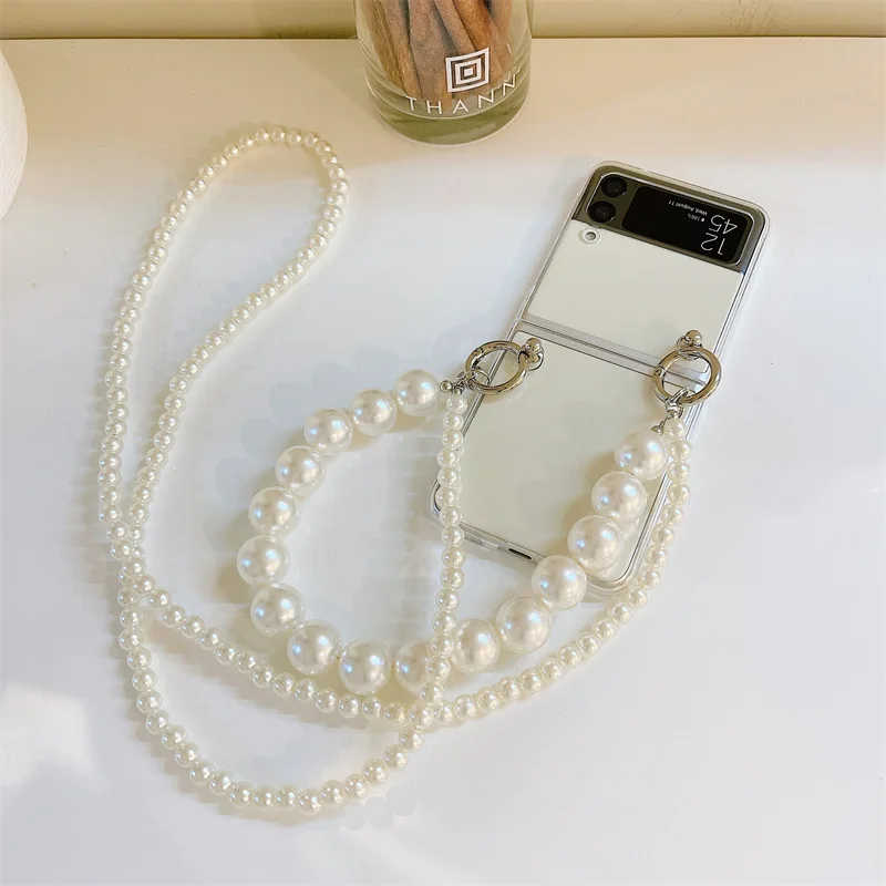 Luxury Long Pearls Chains Lanyard Phone Case for Samsung Galaxy Z Flip 3 Z Flip 4 Hard Back Cover for ZFlip3 ZFlip4 Case Shell
Luxury Long Pearls Chains Lanyard Phone Case for Samsung Galaxy Z Flip 3 Z Flip 4 Hard Back Cover for ZFlip3 ZFlip4 Case Shell