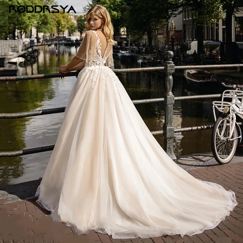 RODDRSYA Pastrol Appliques Wedding Dresses 2023 Tulle Illusion Button Back Custom Made Plus Size Vestido De Novia Bridal Gown
RODDRSYA Pastrol Appliques Wedding Dresses 2023 Tulle Illusion Button Back Custom Made Plus Size Vestido De Novia Bridal Gown