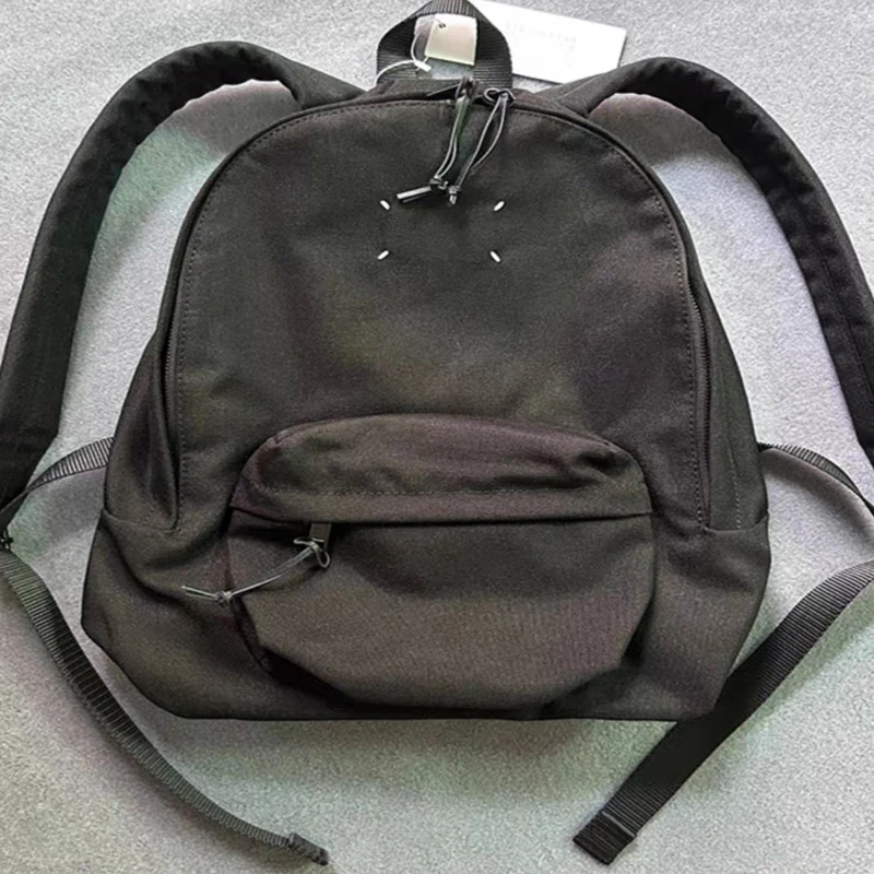 New Canvas MM6 Margiela Backpacks Men Women Best Quality Casual Travel Bag Large Capacity Adjustable Classic Stitch Label Logo B
New Canvas MM6 Margiela Backpacks Men Women Best Quality Casual Travel Bag Large Capacity Adjustable Classic Stitch Label Logo B