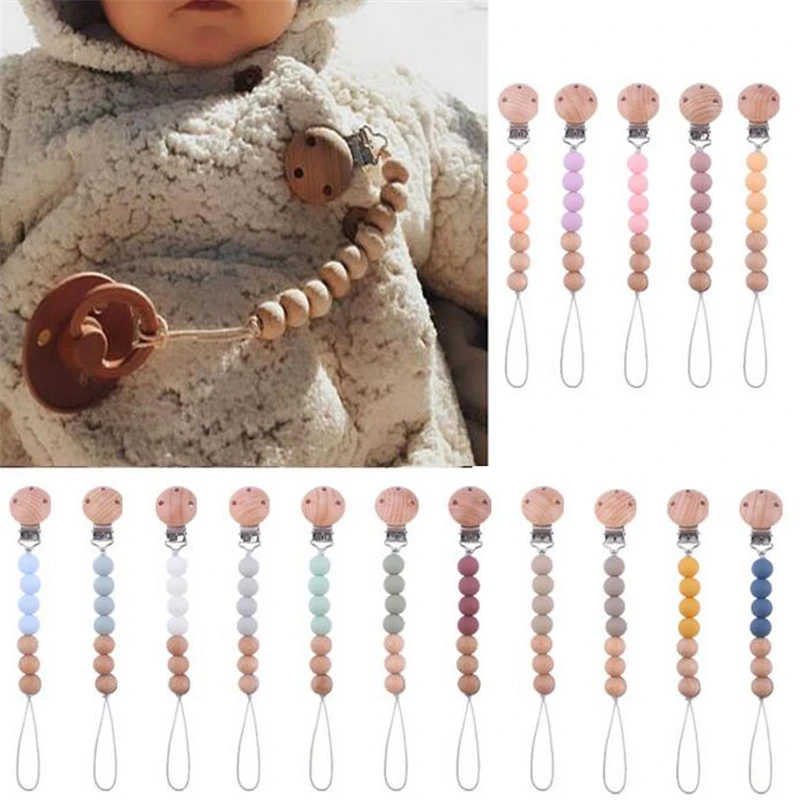 Baby Pacifier Clips Silicone Beads Wooden Ring Pacifier Chain Infant Nipple Appease Soother Chain Clips Dummy Holder Nipple Clip
Baby Pacifier Clips Silicone Beads Wooden Ring Pacifier Chain Infant Nipple Appease Soother Chain Clips Dummy Holder Nipple Clip