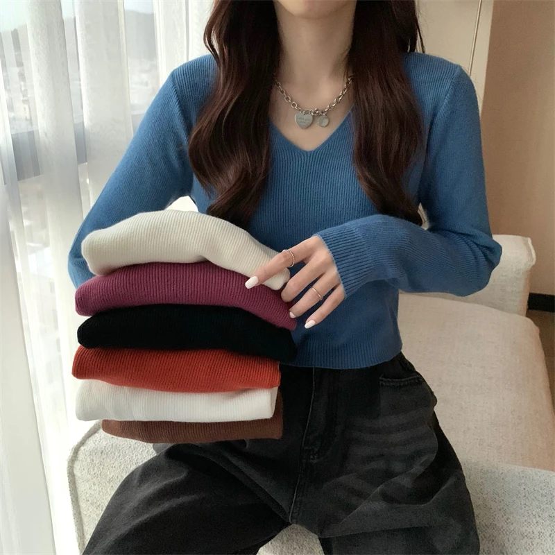 Autumn and Winter New V-neck Casual Fashion Sweet Wild Loose Thin Solid Color High-waisted Short Knit Sweater Top Bottoming Shir
Autumn and Winter New V-neck Casual Fashion Sweet Wild Loose Thin Solid Color High-waisted Short Knit Sweater Top Bottoming Shir