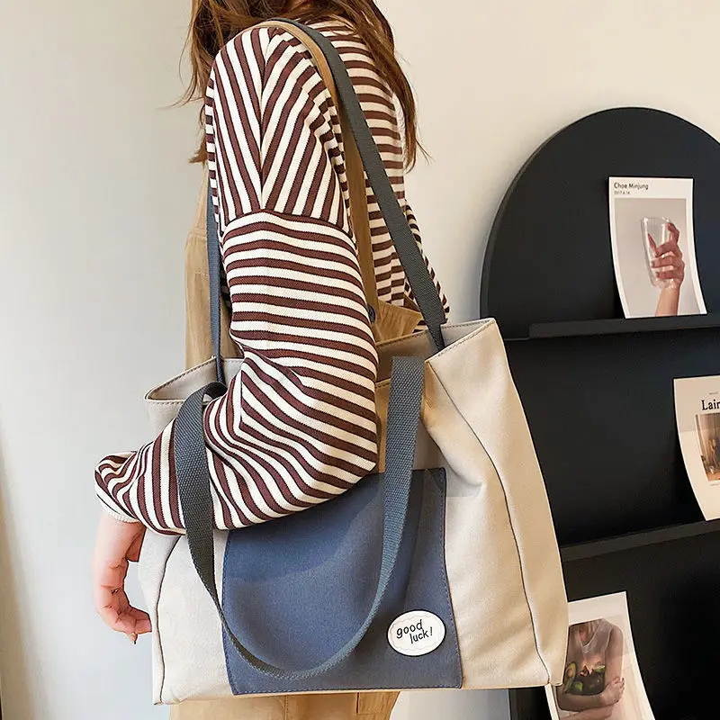 Commuter Canvas Bag Handbag Shopping Women's 2022 New Fashion All-match Large-capacity Shoulder Tote Bag
Commuter Canvas Bag Handbag Shopping Women's 2022 New Fashion All-match Large-capacity Shoulder Tote Bag