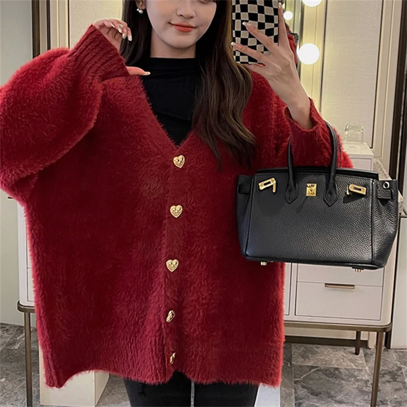 Lazy style sweater woman Fall/Winter 2023 new V-neck fashion love button mink down knitted cardigan woman
Lazy style sweater woman Fall/Winter 2023 new V-neck fashion love button mink down knitted cardigan woman