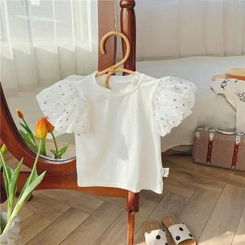 Новинка 2023, летняя белая футболка в горошек для маленьких девочек с пышными рукавами, топы, детская одежда для принцессы на день рождения, детские футболки, одежда
Новинка 2023, летняя белая футболка в горошек для маленьких девочек с пышными рукавами, топы, детская одежда для принцессы на день рождения, детские футболки, одежда