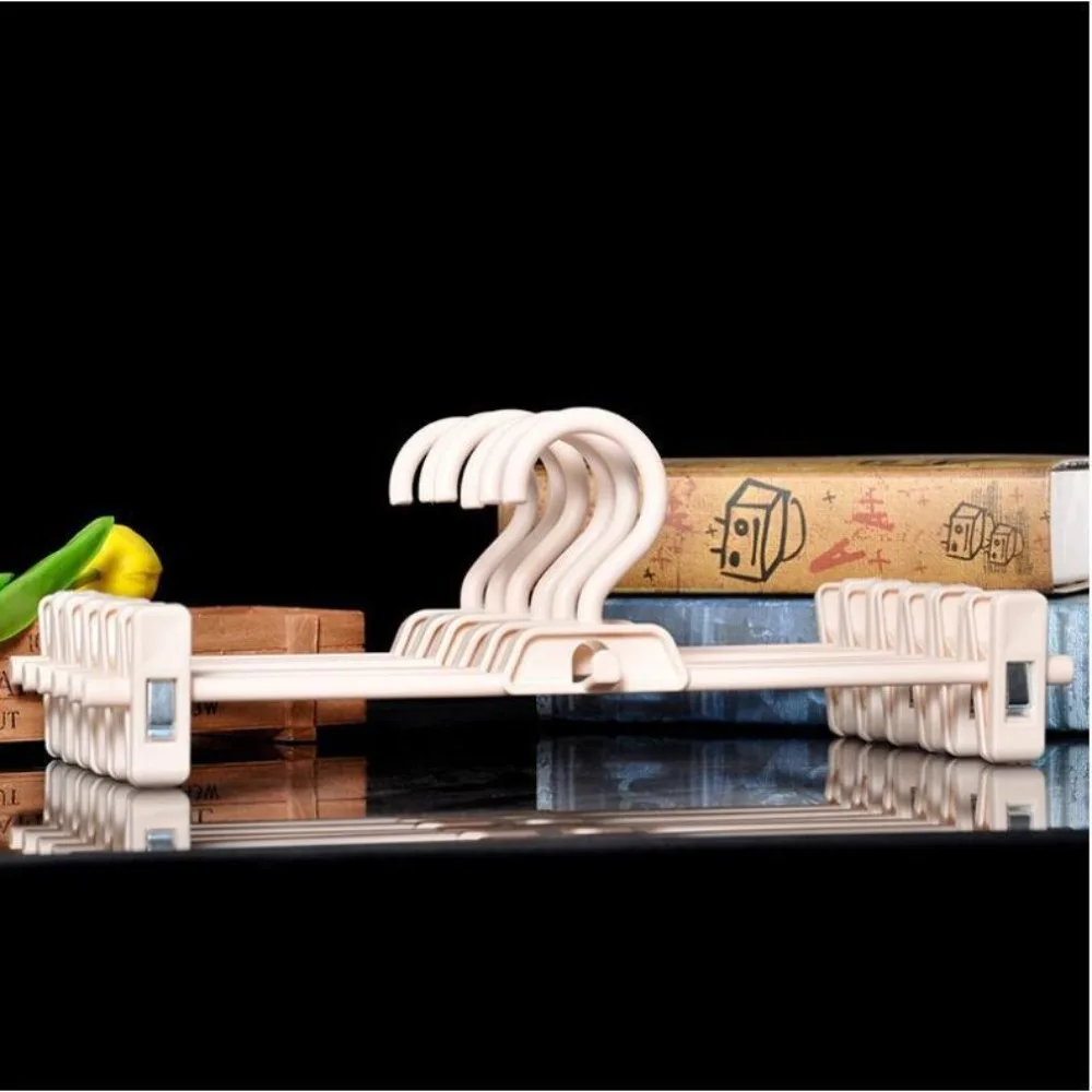 5 шт. Регулируемые акриловые вешалки для юбок 
5 шт. Регулируемые акриловые вешалки для юбок