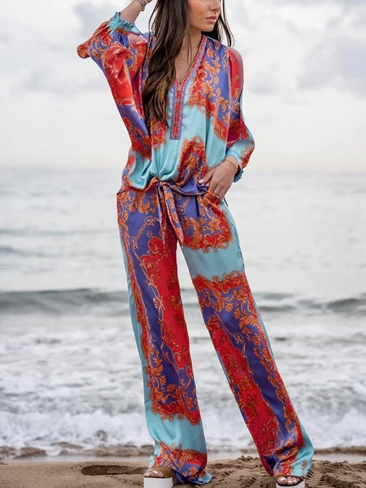 Retro Boho Pattern Print Beach Set Fashion V Neck Hollow Out Belt Tops + Long Draped Pants Outfits Elegant Women Two Piece Set
Retro Boho Pattern Print Beach Set Fashion V Neck Hollow Out Belt Tops + Long Draped Pants Outfits Elegant Women Two Piece Set