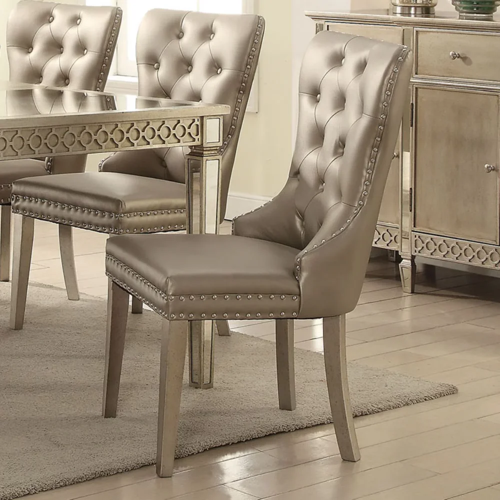 Leatherette Wooden Side Chair with Button Tufted Curved Back, Set of 2, Champagne Silver- Saltoro Sherpi
Leatherette Wooden Side Chair with Button Tufted Curved Back, Set of 2, Champagne Silver- Saltoro Sherpi
