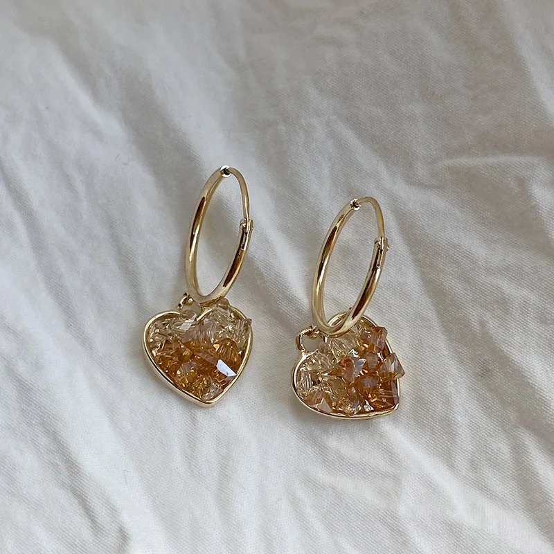 New champagne gradient crystal love ear buckle fashionable temperament peach heart earrings all-match high-end earrings
New champagne gradient crystal love ear buckle fashionable temperament peach heart earrings all-match high-end earrings