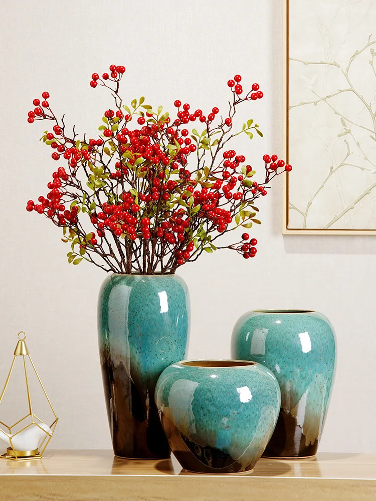 Simple modern Chinese ceramic vase, creative table decoration in the living room
Simple modern Chinese ceramic vase, creative table decoration in the living room