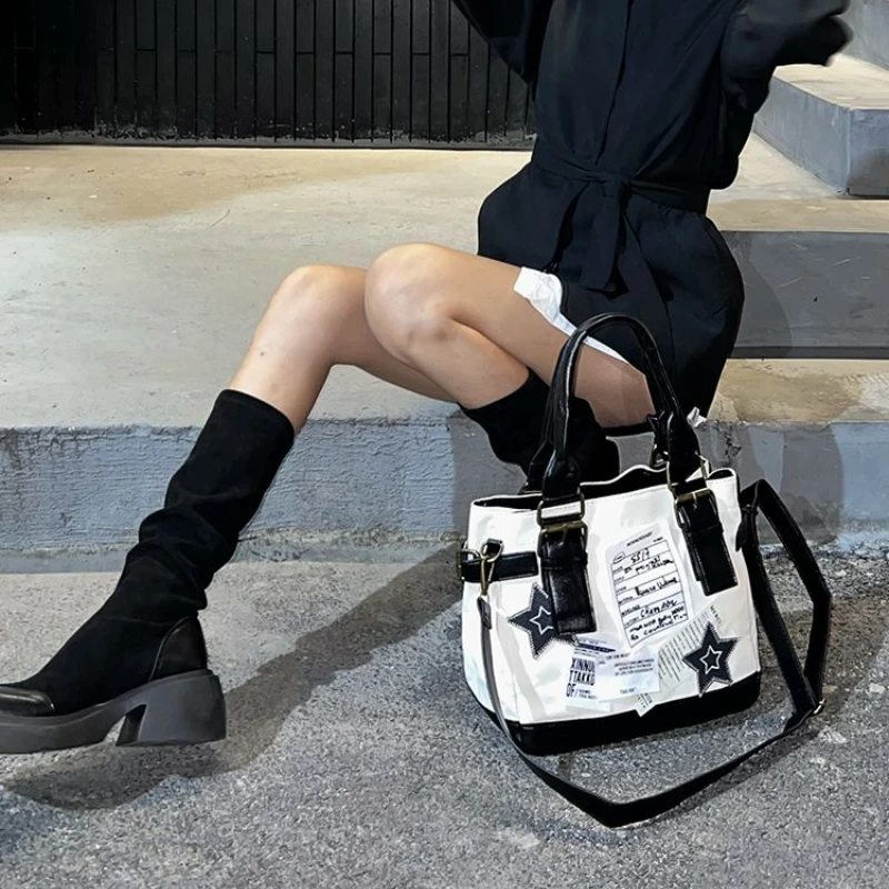 2023 New High Value Y2K Tote Bag Female Retro Large Capacity European and American Texture Handheld Shoulder Crossbody Bag 
2023 New High Value Y2K Tote Bag Female Retro Large Capacity European and American Texture Handheld Shoulder Crossbody Bag
