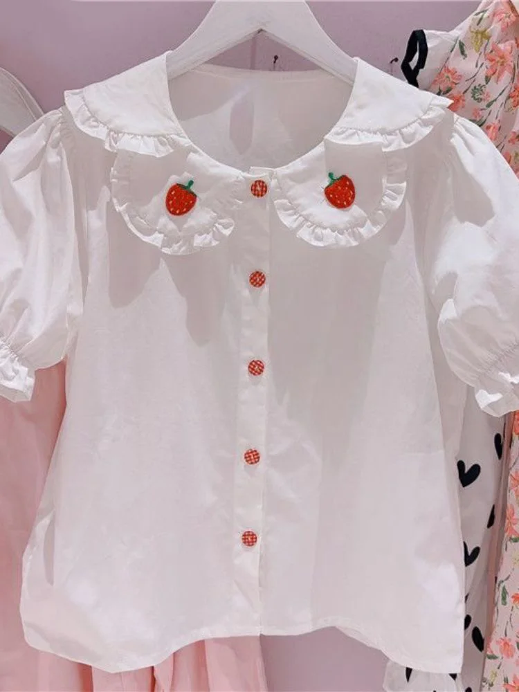 Kawaii Girl Inner Lolita Shirt Female Doll Collar Strawberry White Blouse Women Japanese Sweet Bow Shirts Tops Femme Harajuku
Kawaii Girl Inner Lolita Shirt Female Doll Collar Strawberry White Blouse Women Japanese Sweet Bow Shirts Tops Femme Harajuku