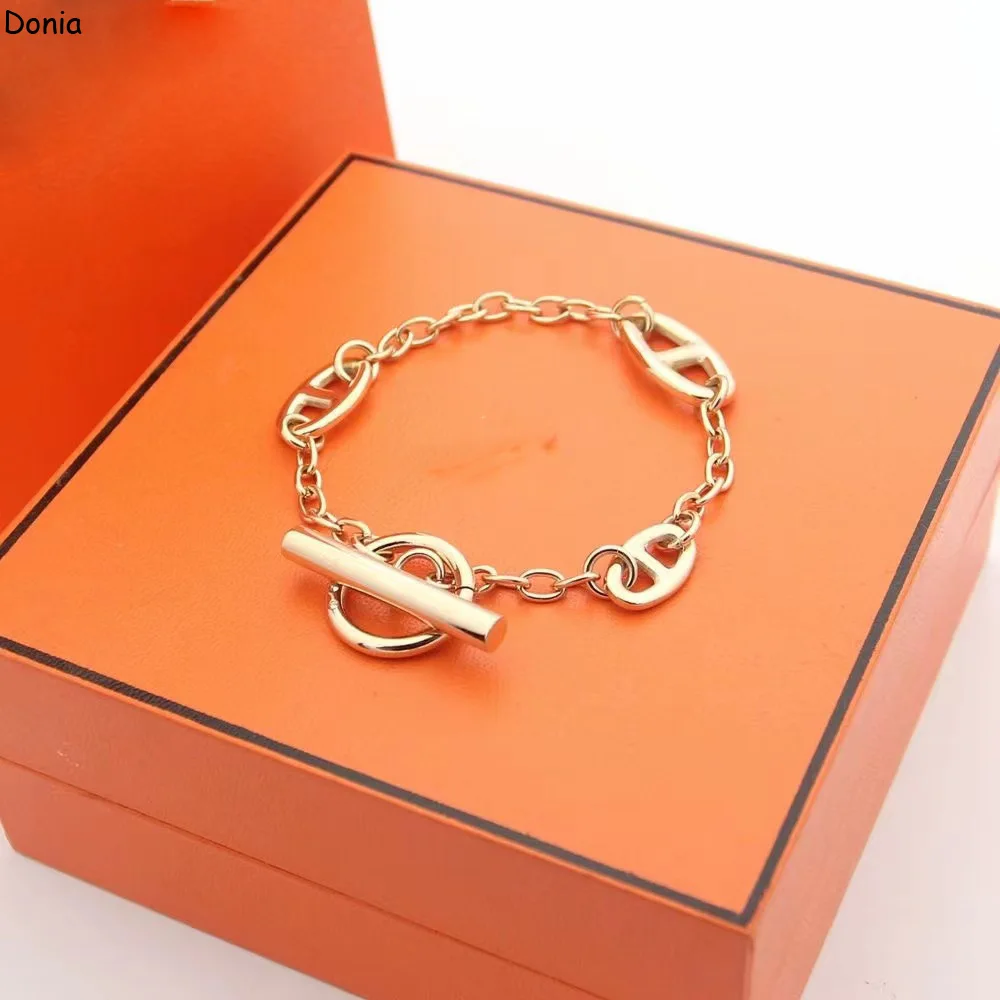 

Donia Jewelry New Fashion Pig Nose Smooth Titanium OT Buckle Palace Luxury Retro Bracelet.