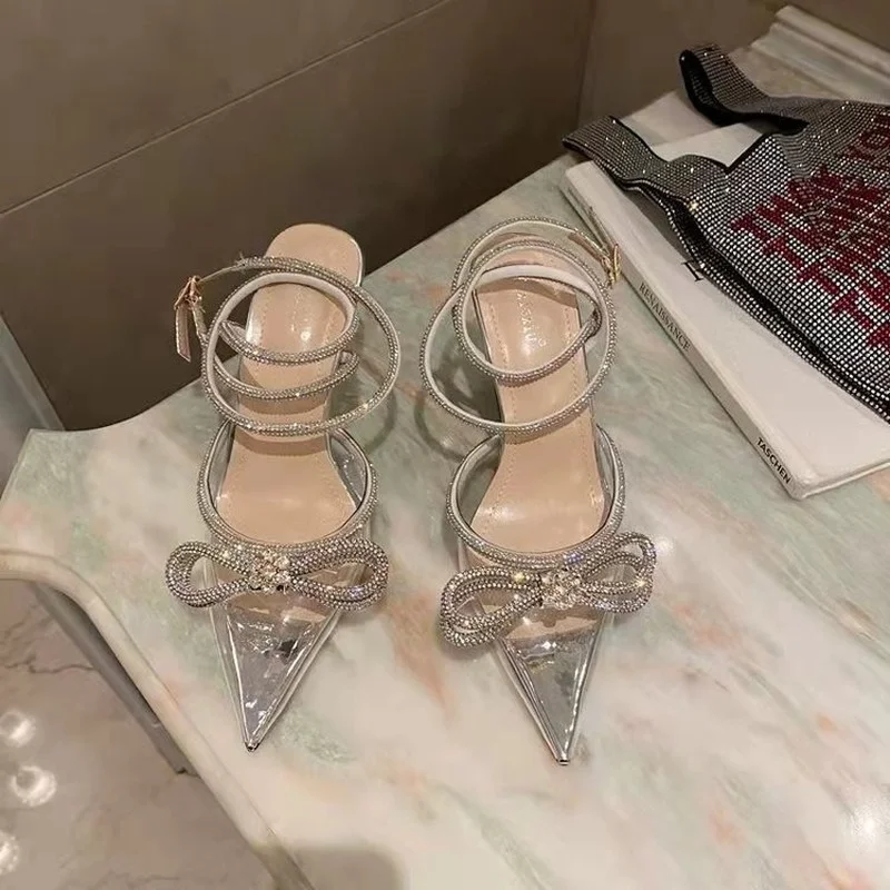 Spring 2022 Women's Shoes Fashion Butterfly-Knot Narrow Band Bling Patchwork Cross-Tied Crystal Pointed Toe Pumps Women Shoes
Spring 2022 Women's Shoes Fashion Butterfly-Knot Narrow Band Bling Patchwork Cross-Tied Crystal Pointed Toe Pumps Women Shoes
