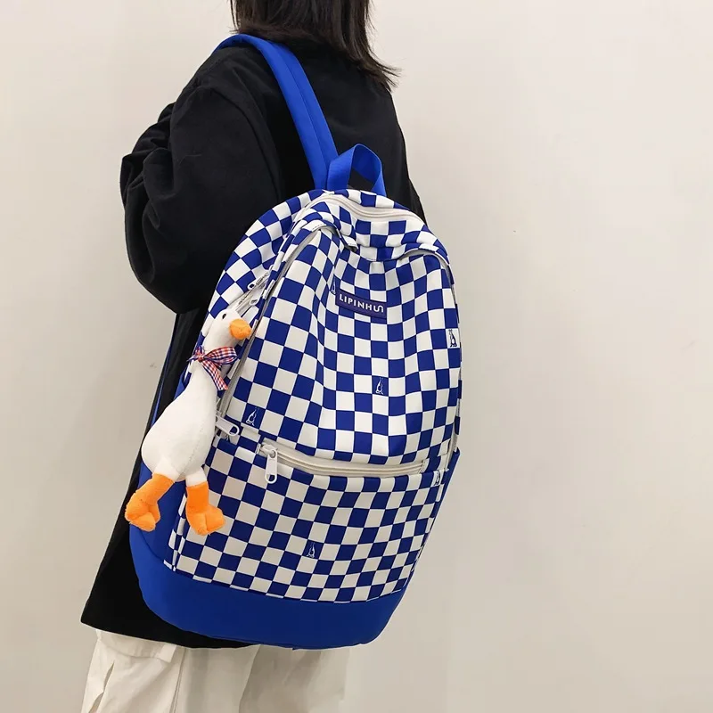 2022 spring new Korean version street trend student nylon schoolbag fashion plaid casual couple backpack
2022 spring new Korean version street trend student nylon schoolbag fashion plaid casual couple backpack