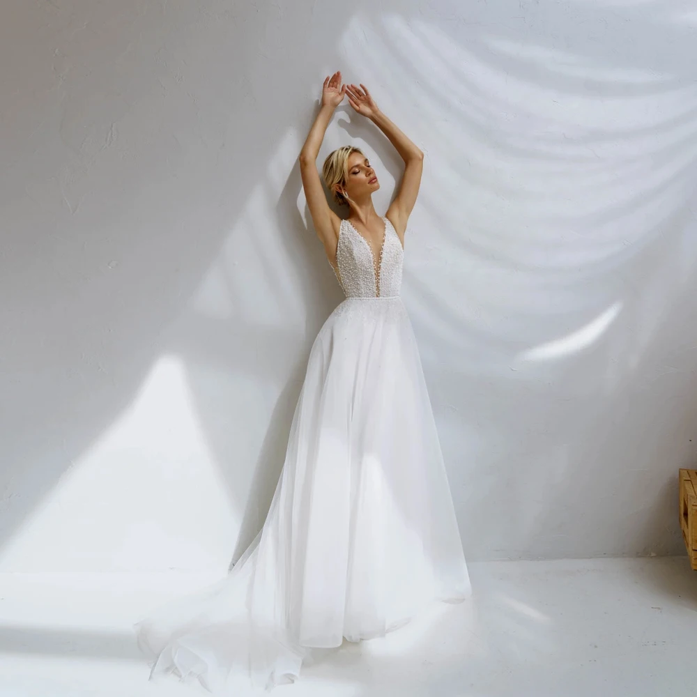 White V Neck Bridal Gowns For Women Spaghetti Strap Sleeveless Wedding Dresses Beaded A-Line Tulle Back Button Vestidos De Novia
White V Neck Bridal Gowns For Women Spaghetti Strap Sleeveless Wedding Dresses Beaded A-Line Tulle Back Button Vestidos De Novia