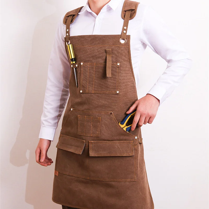 Durable Unisex Canvas Work Apron Barber Baking Cafe Garden Carpentry Restaurant Adjustable Work Wear Apron with Tool Pockets
Durable Unisex Canvas Work Apron Barber Baking Cafe Garden Carpentry Restaurant Adjustable Work Wear Apron with Tool Pockets