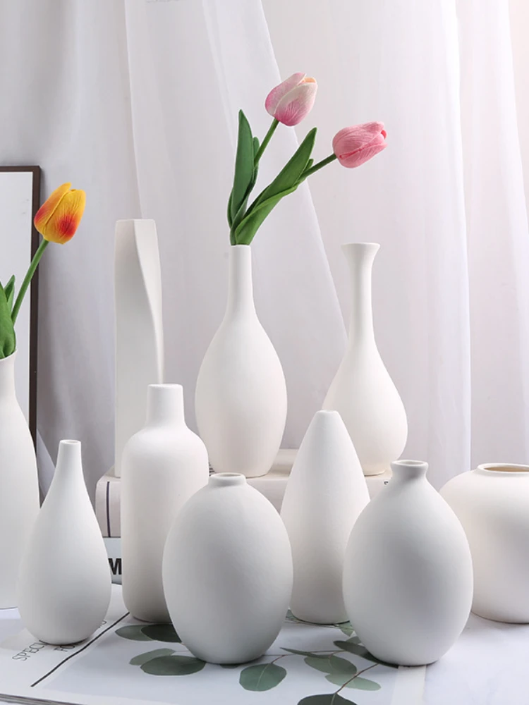 European simple white ceramic vase glazed waterproof tabletop ceramic perfume bottle decoration
European simple white ceramic vase glazed waterproof tabletop ceramic perfume bottle decoration