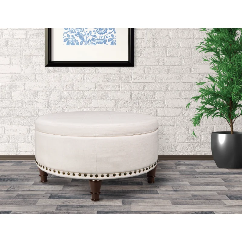 OSP Home Furnishings Augusta Round Storage Ottoman in Linen Fabric with decorative nailheads 
OSP Home Furnishings Augusta Round Storage Ottoman in Linen Fabric with decorative nailheads