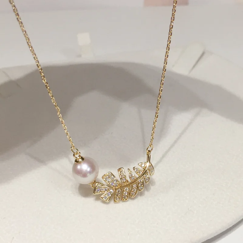 Delicate Natural Freshwater Pearl Necklace 18K Gold Feather Pendant Jewelry Gift for Women Party Banquet Accessories Hot Selling
Delicate Natural Freshwater Pearl Necklace 18K Gold Feather Pendant Jewelry Gift for Women Party Banquet Accessories Hot Selling