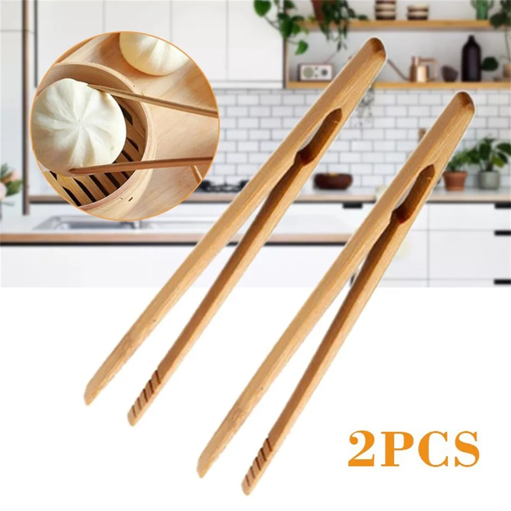 2Pcs Bamboo Wood Wooden Kitchen Utensils Novel Food Toast Salad Tongs Toaster Bacon Sugar Ice Tea Tong
2Pcs Bamboo Wood Wooden Kitchen Utensils Novel Food Toast Salad Tongs Toaster Bacon Sugar Ice Tea Tong