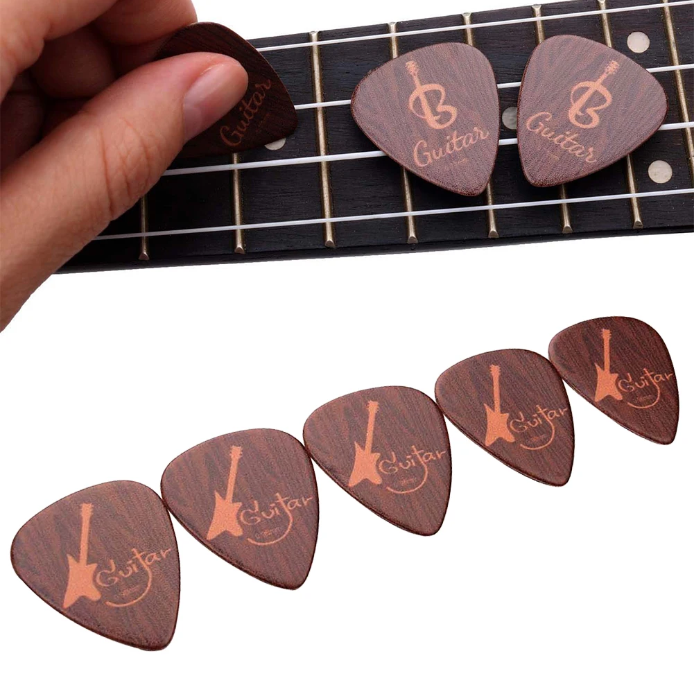 5PCS Portable Acoustic Electric Guitar Picks Celluloid Plectrums Wood Color 0.71MM 0.96MM Guitar Base Accessories
5PCS Portable Acoustic Electric Guitar Picks Celluloid Plectrums Wood Color 0.71MM 0.96MM Guitar Base Accessories