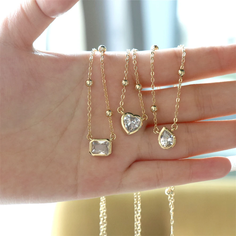 Fashion Minimalist Micro-Inlaid Zircon Heart Shaped Pendant Necklace Female High-quailty Copper Gold Plated Beads Chain Jewelry
Fashion Minimalist Micro-Inlaid Zircon Heart Shaped Pendant Necklace Female High-quailty Copper Gold Plated Beads Chain Jewelry