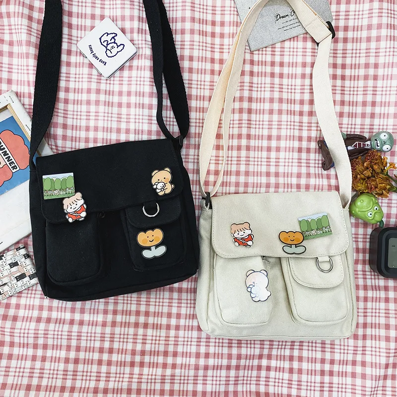 New Messenger Shoulder Bag Japanese Harajuku Wild Style Canvas Flip Bag Cute Storage Cloth Bag Student Casual Fashion Travel Bag
New Messenger Shoulder Bag Japanese Harajuku Wild Style Canvas Flip Bag Cute Storage Cloth Bag Student Casual Fashion Travel Bag